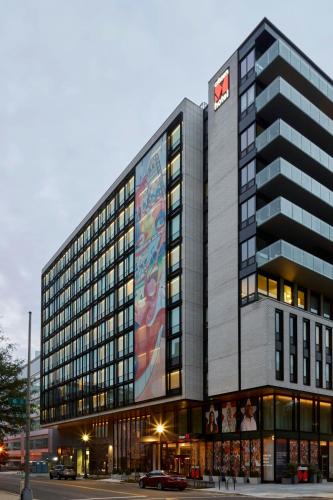 a large building with a large advertisement on it at citizenM Washington DC Capitol in Washington, D.C.