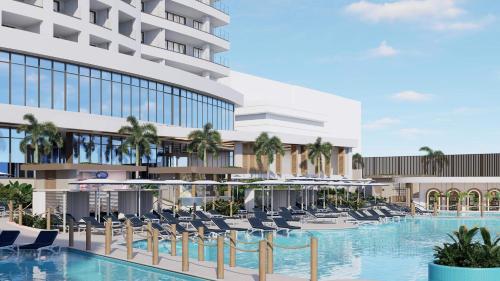 an artist rendering of the exterior of a hotel with a swimming pool at Beach Palace Family Resort & Spa - All Inclusive in Cancún