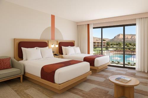 Ένα ή περισσότερα κρεβάτια σε δωμάτιο στο Outbound Sedona