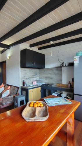 Kuchyň nebo kuchyňský kout v ubytování Departamento vista al lago