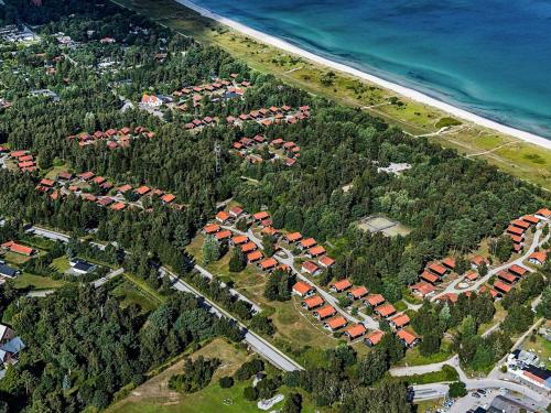 an aerial view of a resort complex next to the ocean at Holiday home with waterpark access in Væggerløse in Marielyst