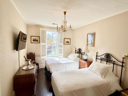 Postel nebo postele na pokoji v ubytování Hotel St. Helena