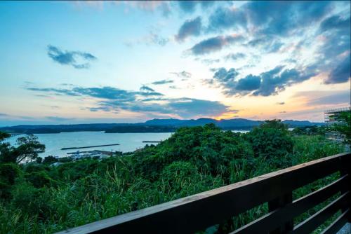a view of a body of water at sunset at Kori Terrace N in Kouri