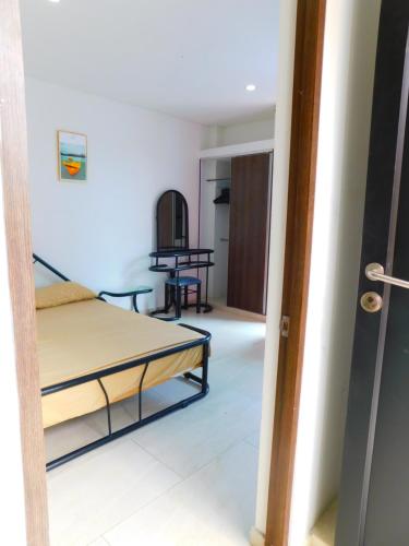 Postel nebo postele na pokoji v ubytování Casa Vacacional - Portales del Sol 1