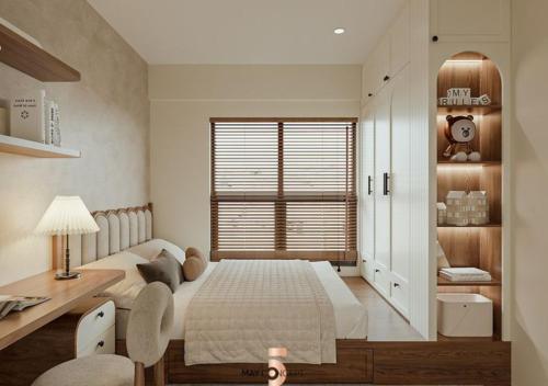 a bedroom with a bed and a desk and a window at Ơ Kìa Home in Da Nang