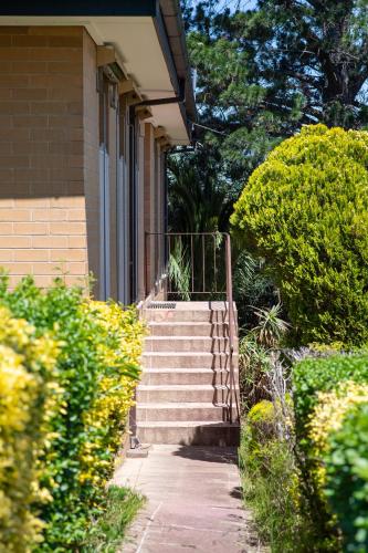 a set of stairs leading up to a building at The Valley View Guest House in Melbourne