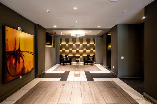 Ένα ή περισσότερα κρεβάτια σε δωμάτιο στο Luxury 2BR Stay Pool, Gym and Chill Areas