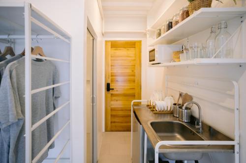 Η κουζίνα ή μικρή κουζίνα στο Canopyproperties