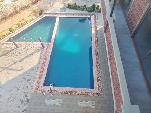 an overhead view of a swimming pool in a building at The windsor Retreat in Moratuwa