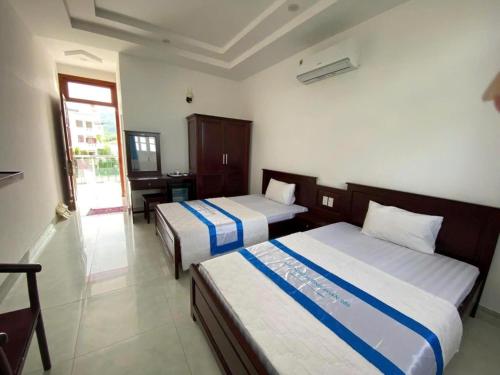 Ένα ή περισσότερα κρεβάτια σε δωμάτιο στο Khu Nghỉ Dưỡng Đoàn 298 - Khách Sạn 3 Tầng