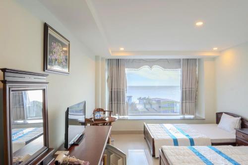 Ein Bett oder Betten in einem Zimmer der Unterkunft Khu Nghỉ Dưỡng Đoàn 298 - Khách Sạn 3 Tầng