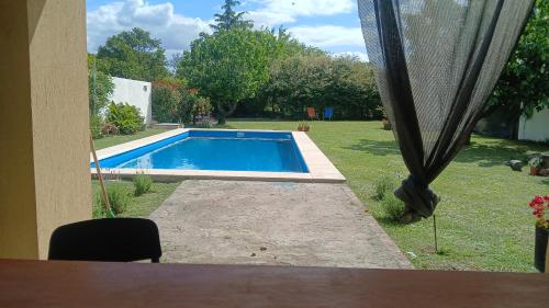 a view of a swimming pool in a yard at Doña Antonia in Albarellos