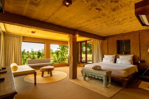 Postel nebo postele na pokoji v ubytování Anavya Farm villa