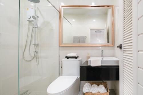 Koupelna v ubytování Chao Wilai Residence I Naiyang Beach I HKT Airport