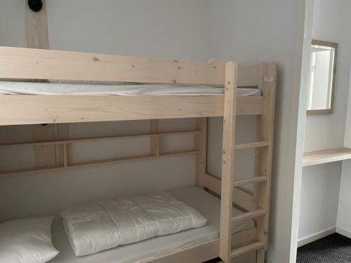 a bunk bed room with two bunk beds at Studio cosy à Gourette, 6 pers, animaux admis - FR-1-860-36 in Gourette