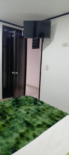 Un pat sau paturi într-o cameră la Madisson