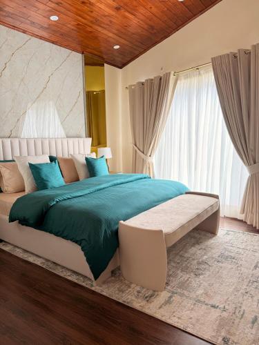 Voodi või voodid majutusasutuse Mountain view cottage toas