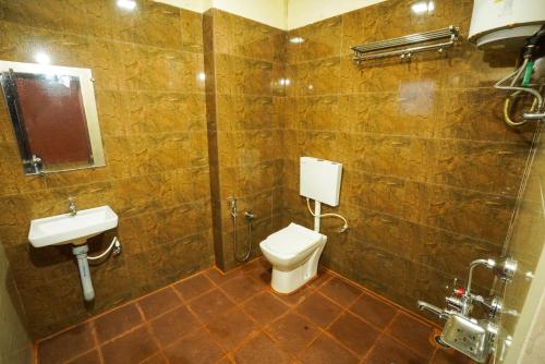 Ένα μπάνιο στο PARIJATHA INN