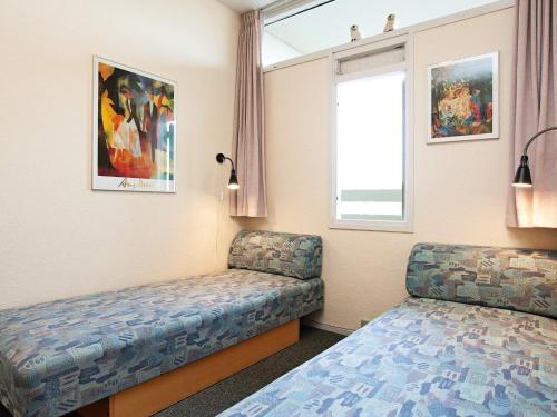 Ένα ή περισσότερα κρεβάτια σε δωμάτιο στο Inviting holiday home in Fanø