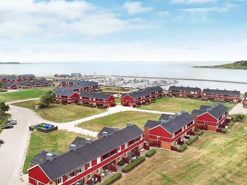 an aerial view of a building near the water at 4 person holiday home on a holiday park in Lemvig in Lemvig