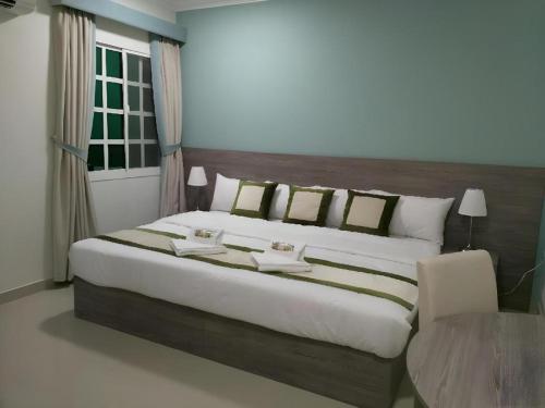 Ένα ή περισσότερα κρεβάτια σε δωμάτιο στο Sovereign Hotel - Marriage Certificate Required