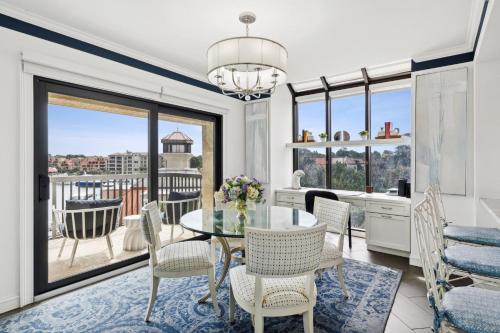 a kitchen and dining room with a table and chairs at 236 Captains Quarters in Hilton Head Island