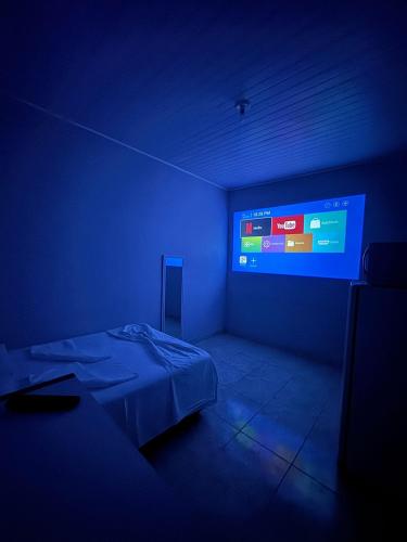 Ένα ή περισσότερα κρεβάτια σε δωμάτιο στο Hospede-se No Coração de SP