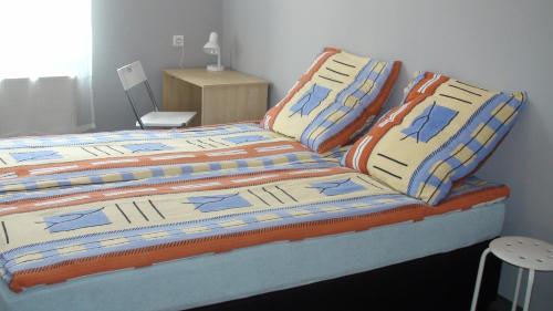 Posteľ alebo postele v izbe v ubytovaní Hostel Kamienna Centrum