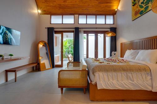 Postel nebo postele na pokoji v ubytování Honeymoon 1BR Villa Gardenia LaLuxe C9 Sanur