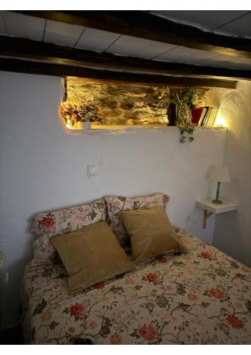 Ένα ή περισσότερα κρεβάτια σε δωμάτιο στο Casa Tia Anica