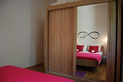 Postel nebo postele na pokoji v ubytování Apartment Divina