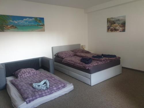 Postel nebo postele na pokoji v ubytování Kleine Oase bei Nina 2