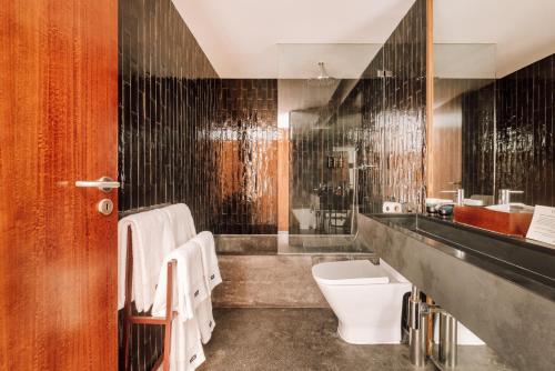 Koupelna v ubytování L'AND Vineyards - Relais & Châteaux