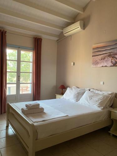 Ένα ή περισσότερα κρεβάτια σε δωμάτιο στο Gregory's Village