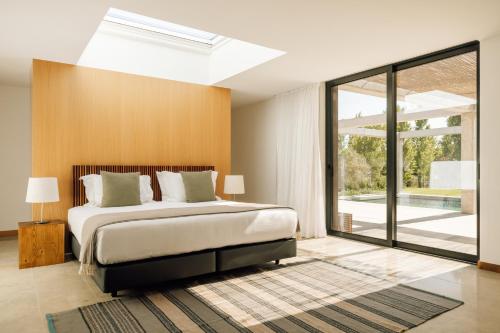 Postel nebo postele na pokoji v ubytování L'AND Vineyards - Relais & Châteaux