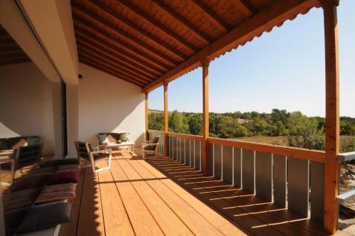 a balcony of a house with a view at Casal de Palácios in Bragança