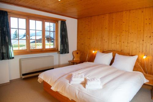 Ένα ή περισσότερα κρεβάτια σε δωμάτιο στο 1909 Tgampi Saura 28