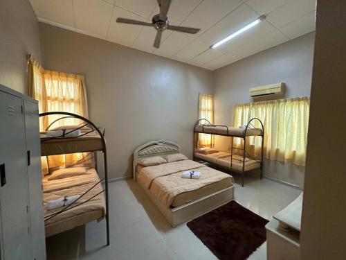 Ένα ή περισσότερα κρεβάτια σε δωμάτιο στο GS Homestay Whole Villa