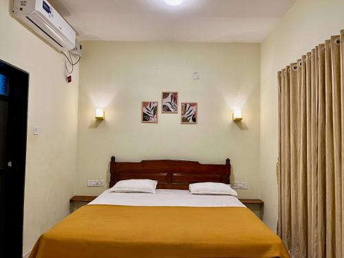 Postel nebo postele na pokoji v ubytování PALM VISTA HOMESTAY