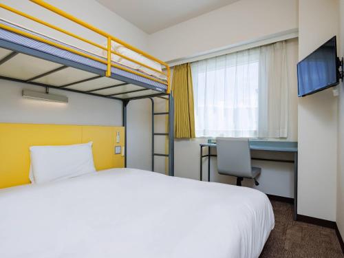 Postel nebo postele na pokoji v ubytování Comfort Inn Shiojiri Kita Inter
