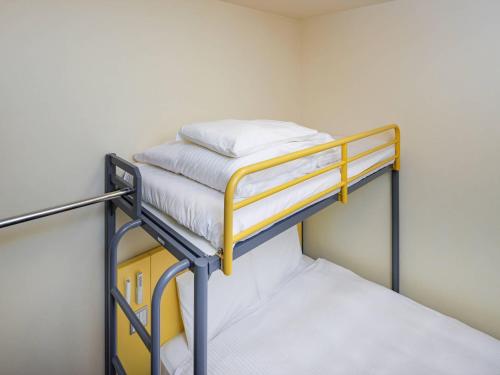 Postel nebo postele na pokoji v ubytování Comfort Inn Sano Fujioka Inter