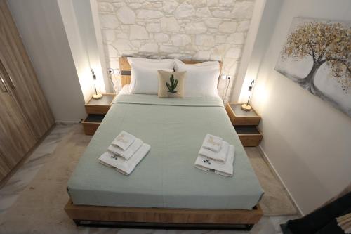 Postel nebo postele na pokoji v ubytování LA Larissa Luxury Apartments Peneus