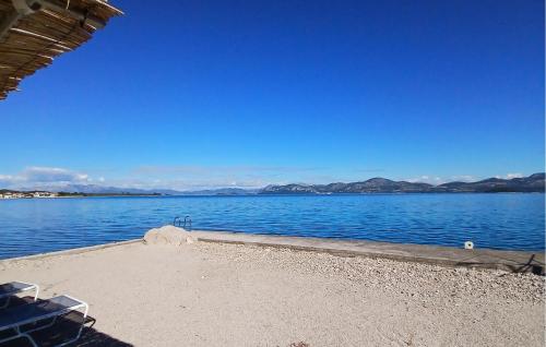 a view of a large body of water at Amazing Apartment In Janjina With Lake View in Drače