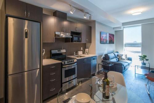 Kuchyň nebo kuchyňský kout v ubytování Corporate Stays Lisgar 2 Bedrooms