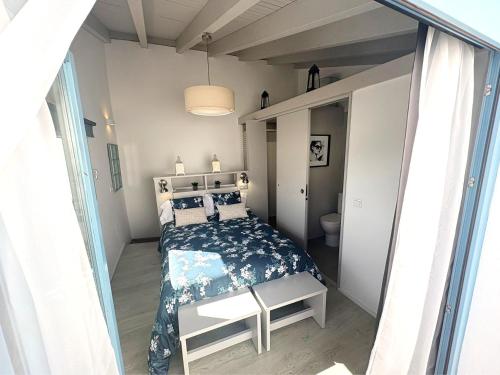 Ένα ή περισσότερα κρεβάτια σε δωμάτιο στο XXIX Casa El Balcón