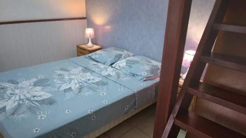 Postel nebo postele na pokoji v ubytování Studio chaleureux à Saint François – 20 m² avec terrasse