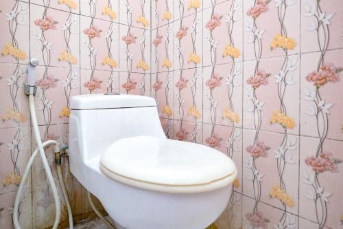 Koupelna v ubytování Pondok Daun D Martin Mitra RedDoorz near UMY