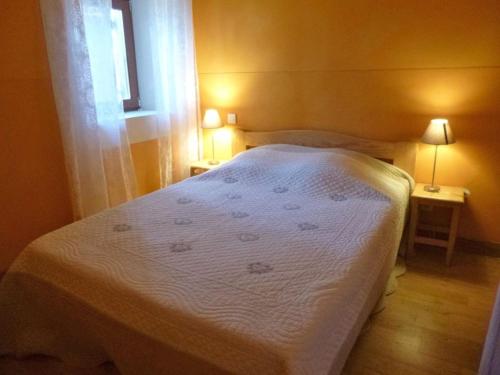 Postel nebo postele na pokoji v ubytování Les Orchis