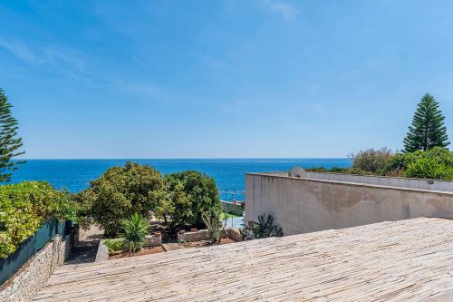 a view of the ocean from the roof of a house at Villa fronte mare nel Salento in Castro di Lecce