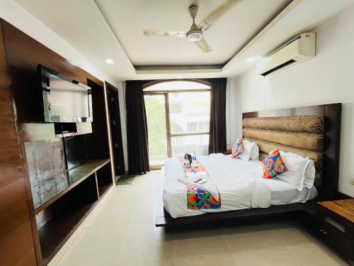 Ένα ή περισσότερα κρεβάτια σε δωμάτιο στο Hotel Scorpio inn